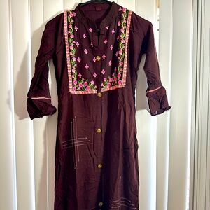 Elevate your wardrobe with this beautiful kurti! Its breathable fabric.